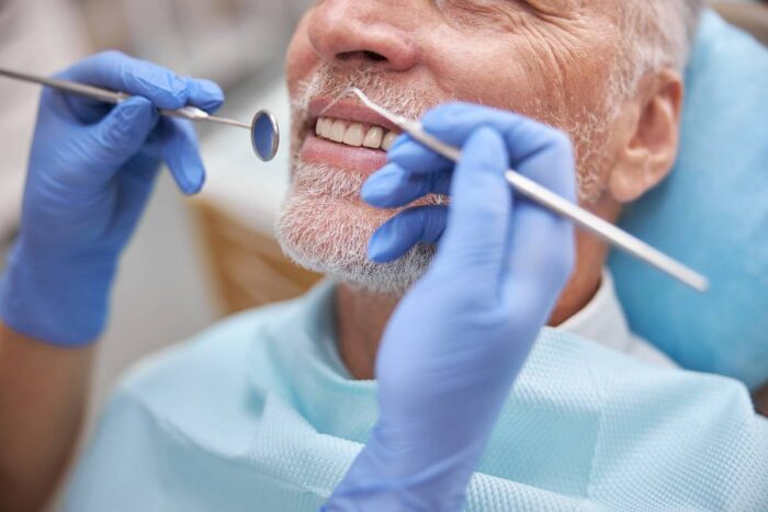 Dentures Vs. Dental Implants: Which Is Best For Seniors?